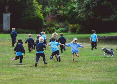 Children playing on field